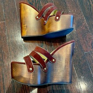 Never Worn Jimmy Choo brown wood wedges. These are high and fantastic. Size 38